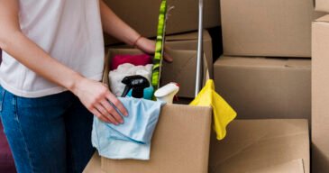 crop-woman-packing-boxes